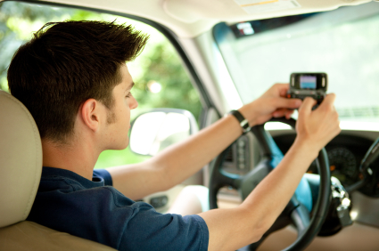 teen texting behind the wheel