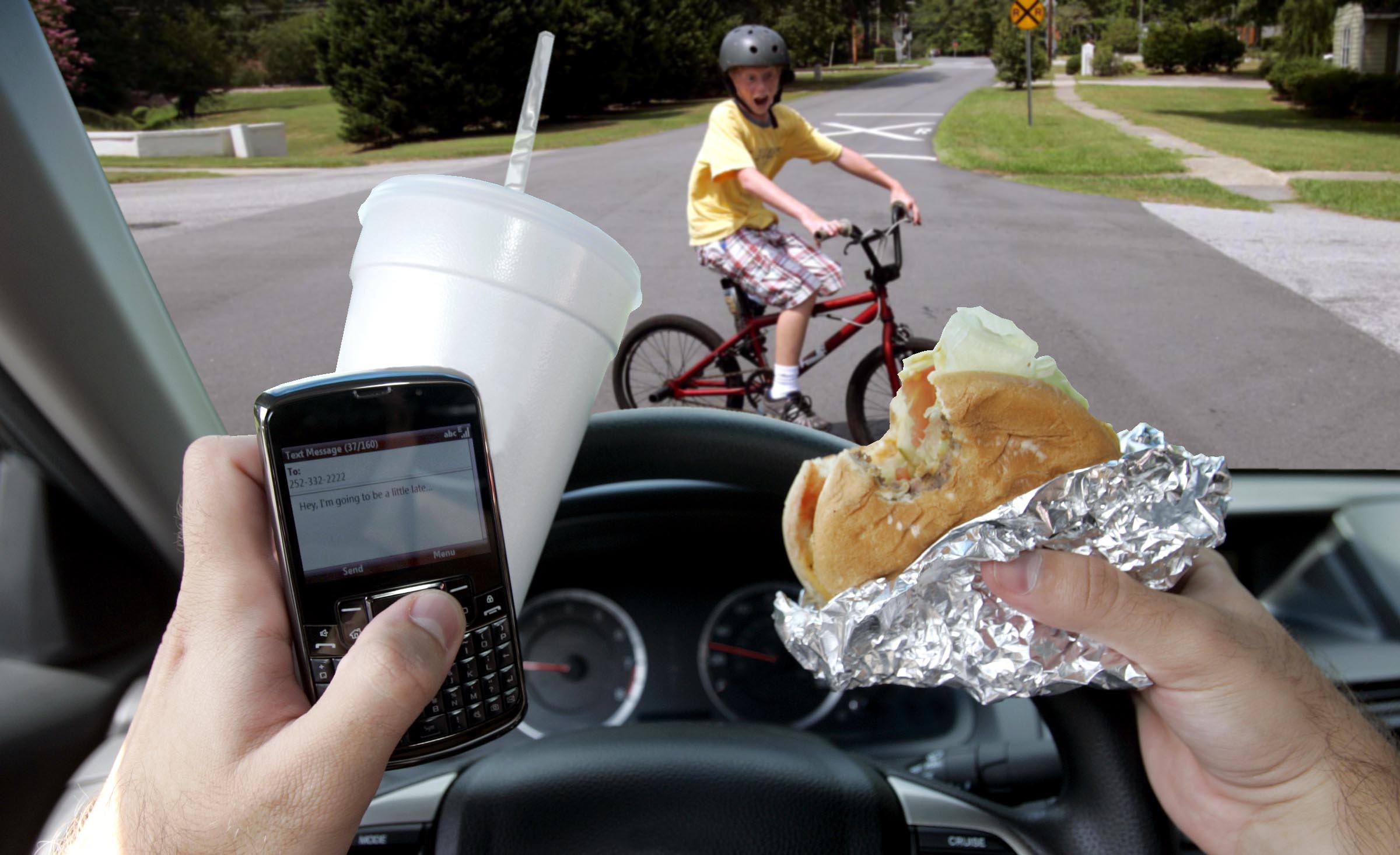 driving while eating lunch and talking on a cell phone